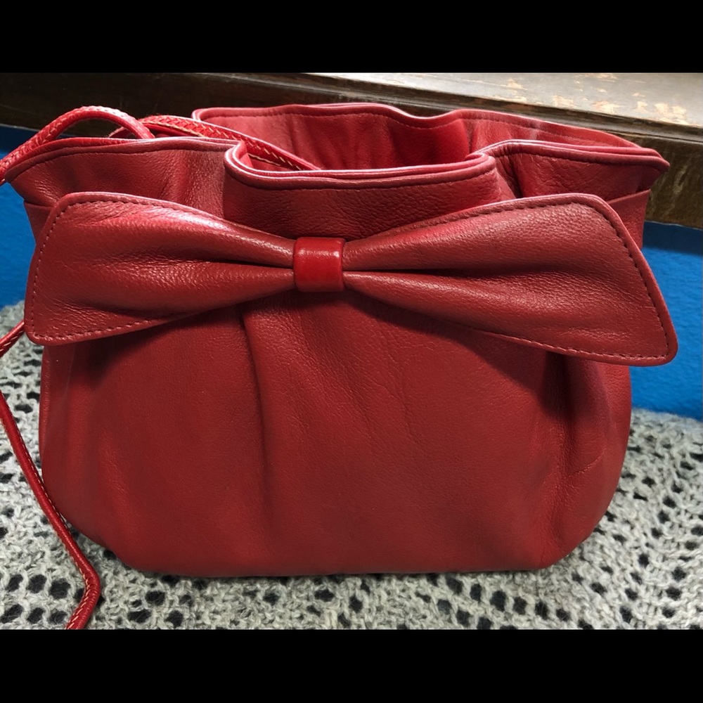 Cute red leather handbag with bow